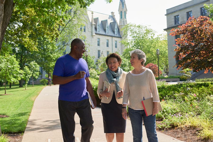 seniors laughing on a walk