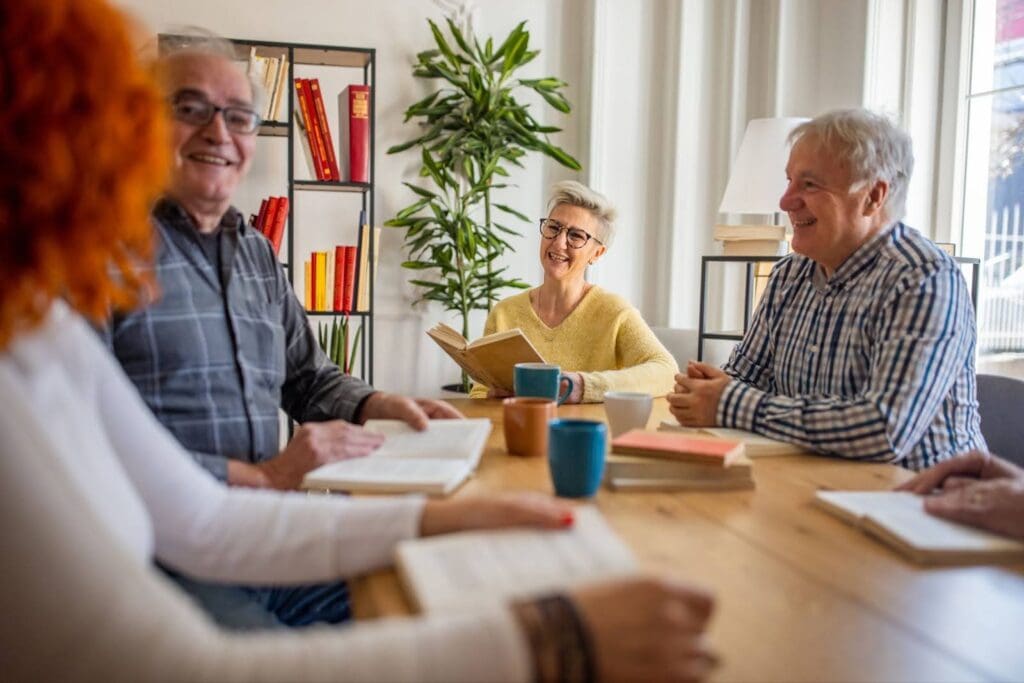Group of seniors discussing books
