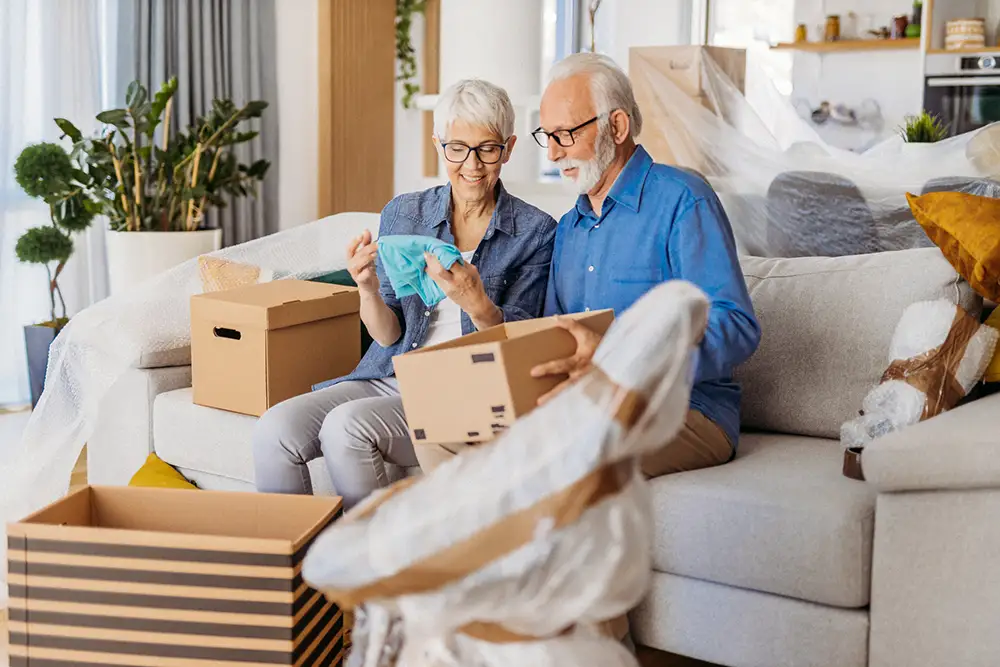 senior couple downsizing for senior living