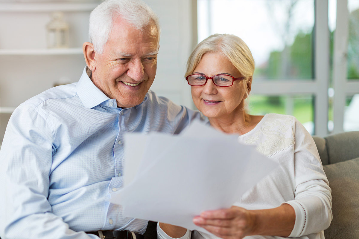 Senior couple reviewing their financials